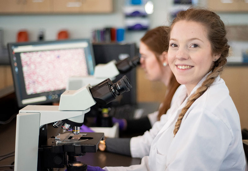 Students learning in a CNA lab and classroom environment
