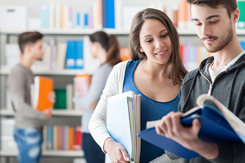 Happy Students in a Library setting